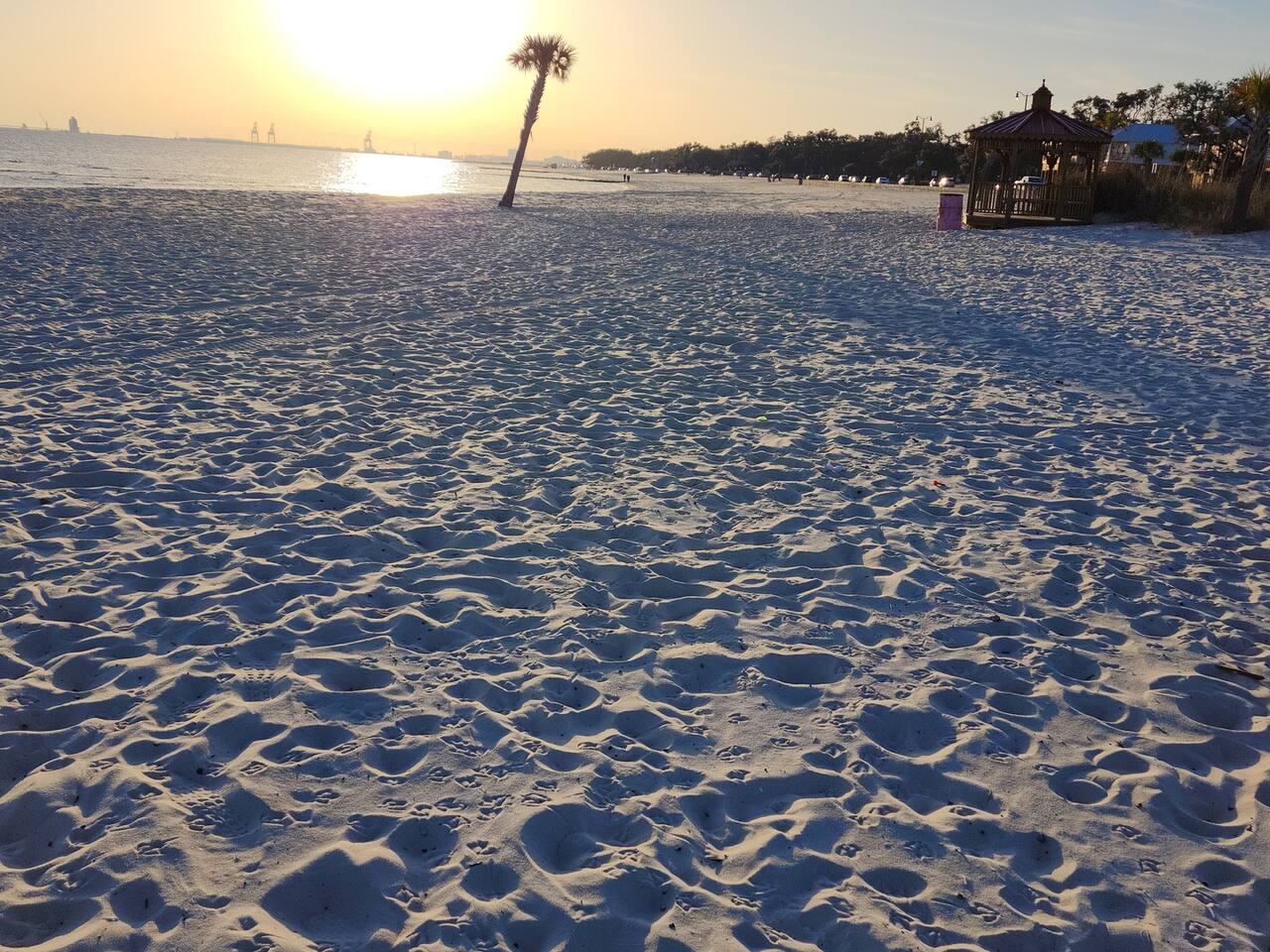 Sunset over the sand on the Gulfport beach