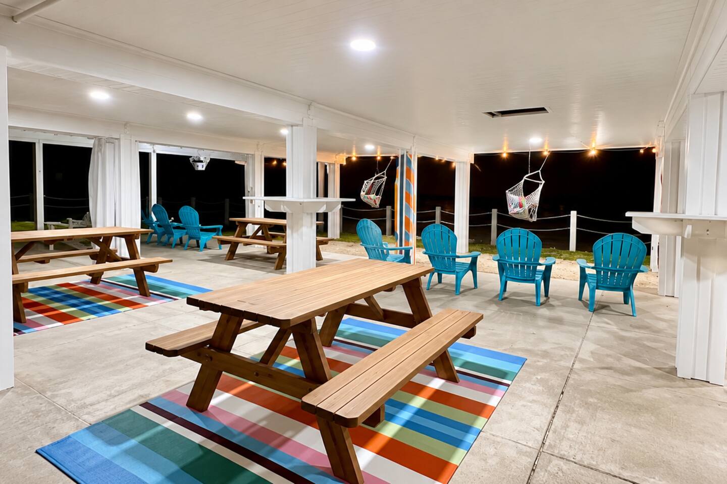 Covered outdoor pavilion with picnic tables