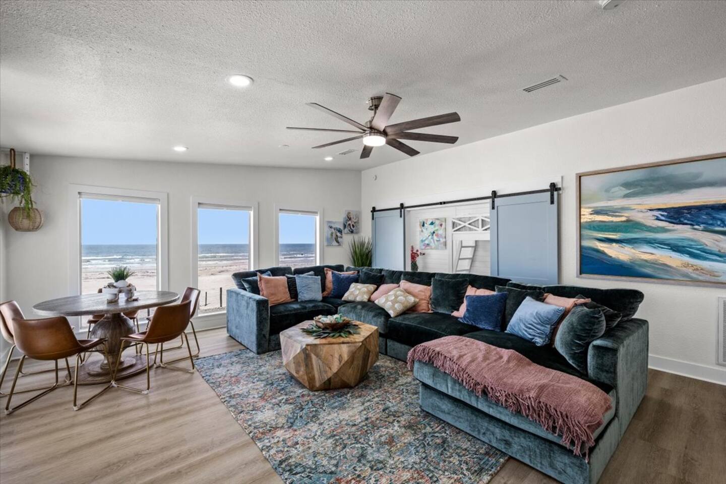 Open living room with wall-to-wall Gulf views