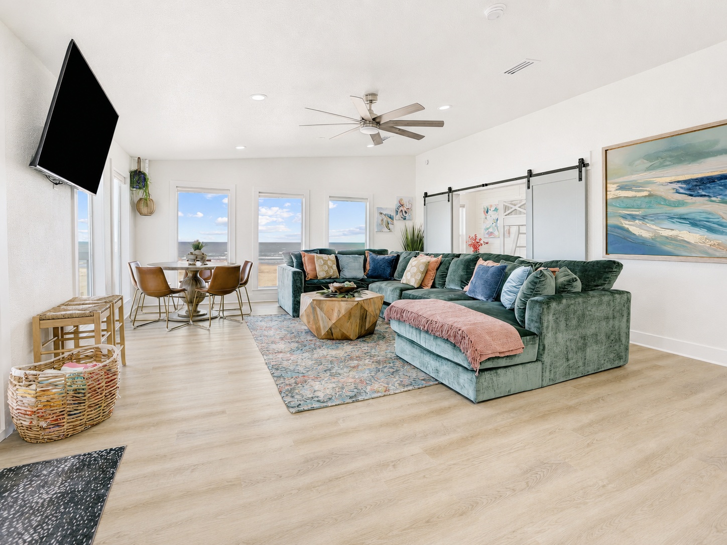 Living room with wall-to-wall beach views
