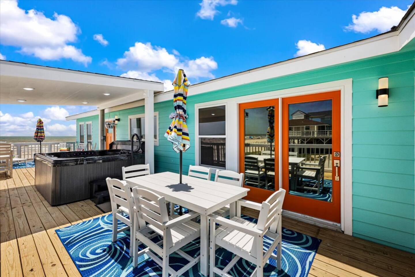 Deck dining table overlooking the water