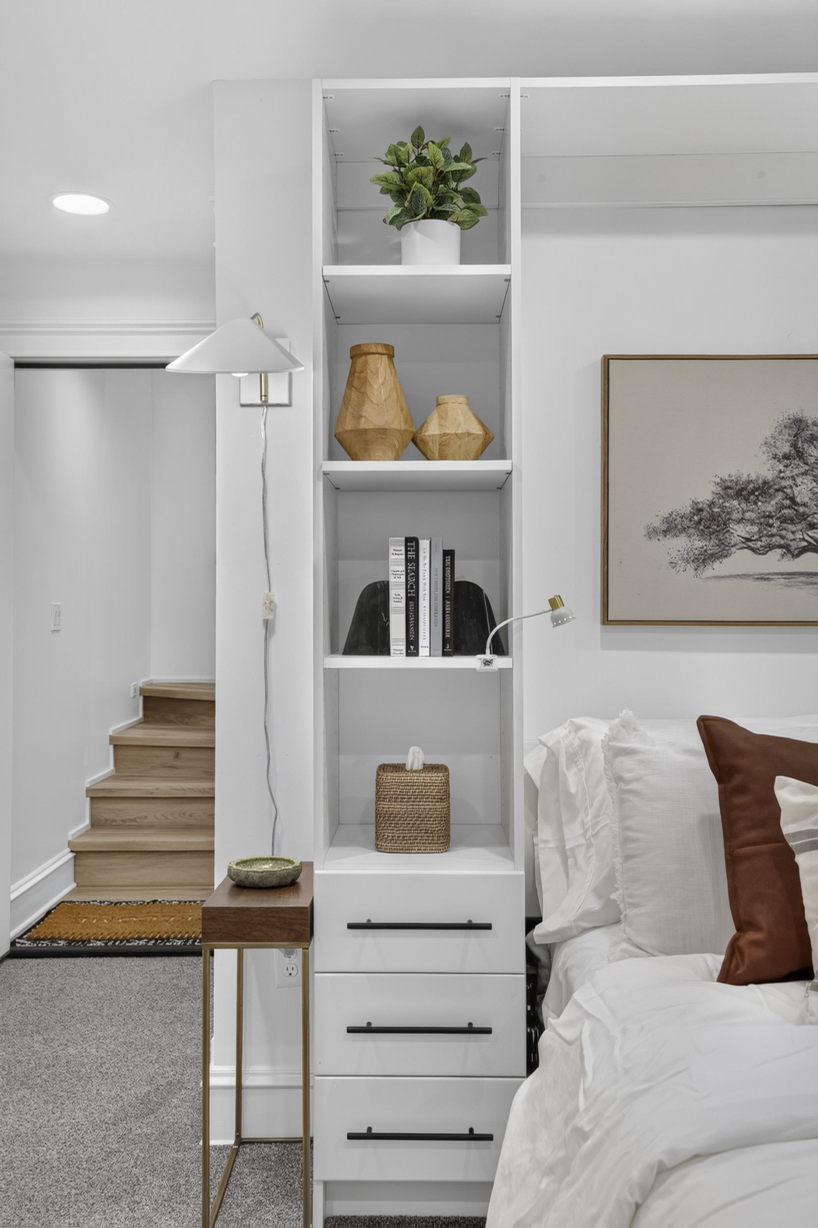 Cozy modern bedroom with built-in storage and stylish decor