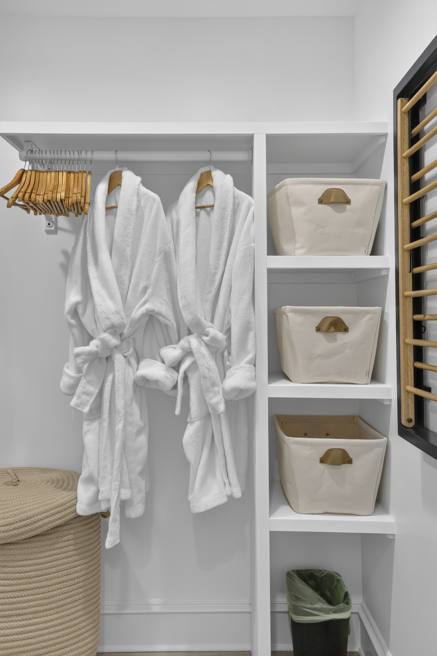 Hotel-style robes and organized storage for a comfortable, clutter-free stay