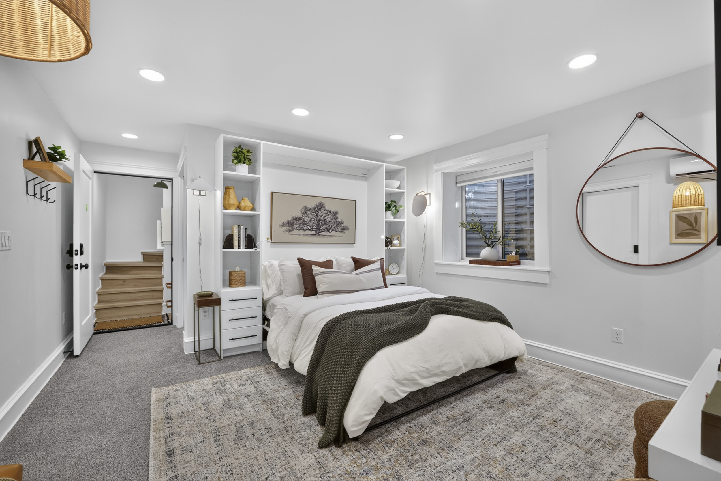 Bright cozy bedroom with custom built-ins and stylish modern touches