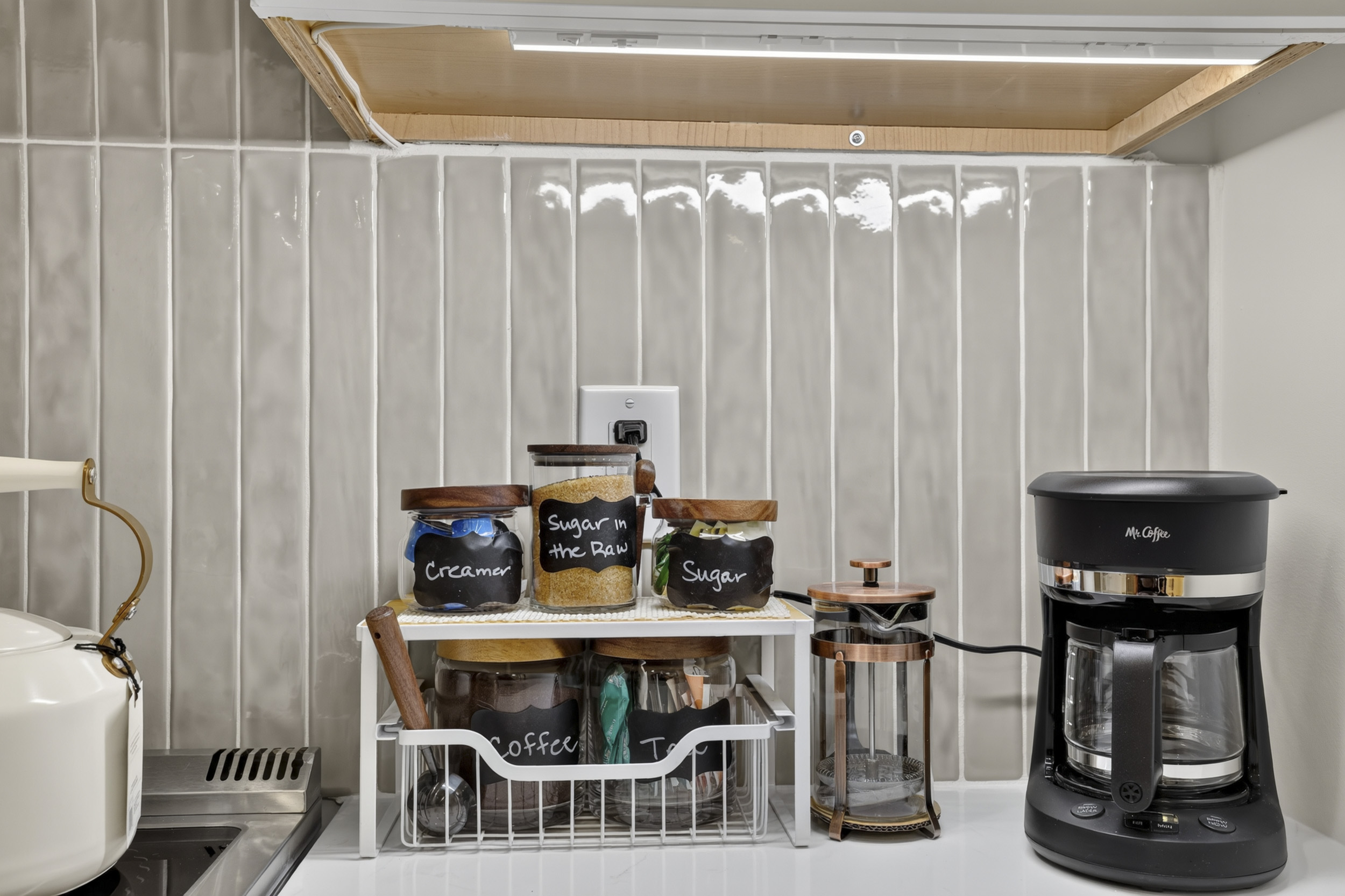 Stylish coffee station with drip maker, French press, and organized essentials