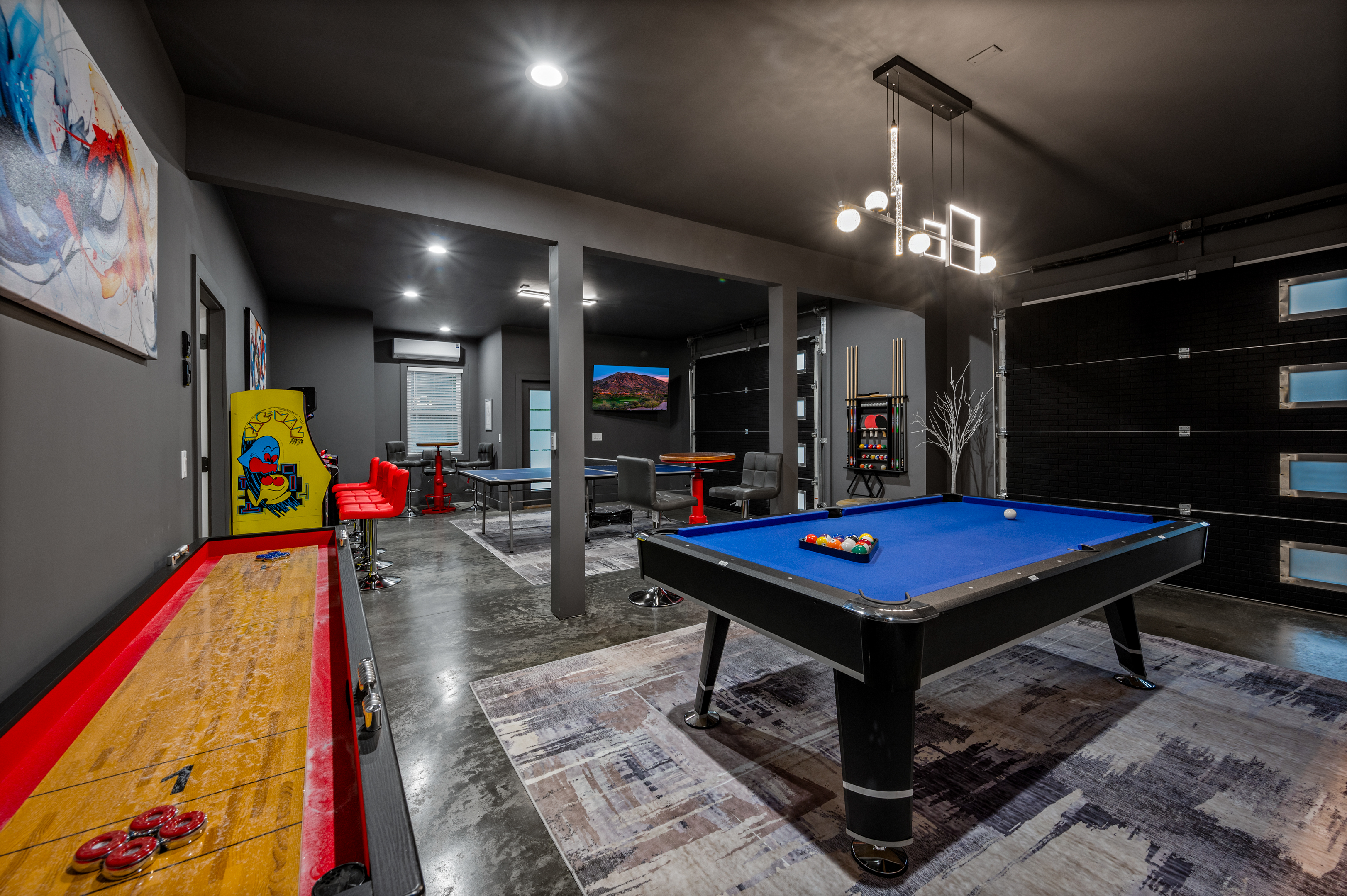 Game room with pool, shuffleboard and ping pong