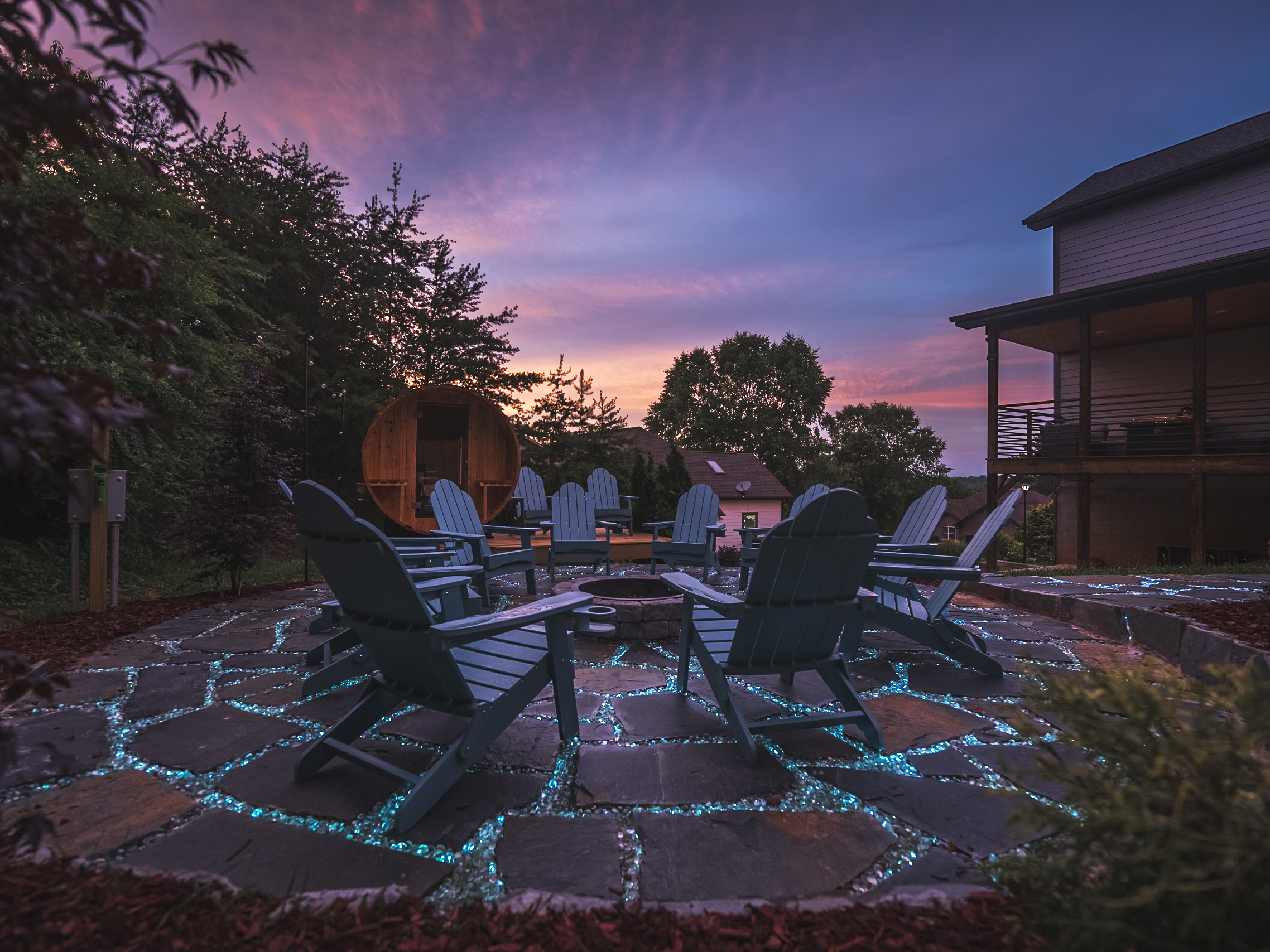 Enchanting fire pit patio with glowing stonework