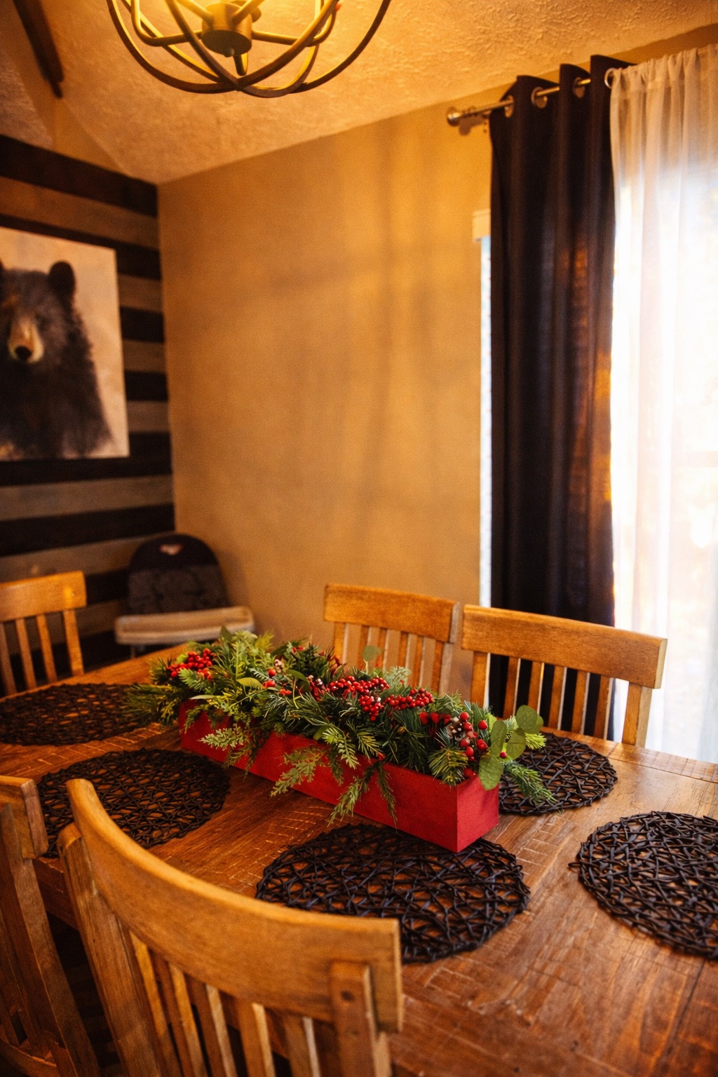 Cozy rustic dining area with warm wood finishes and cabin-style charm
