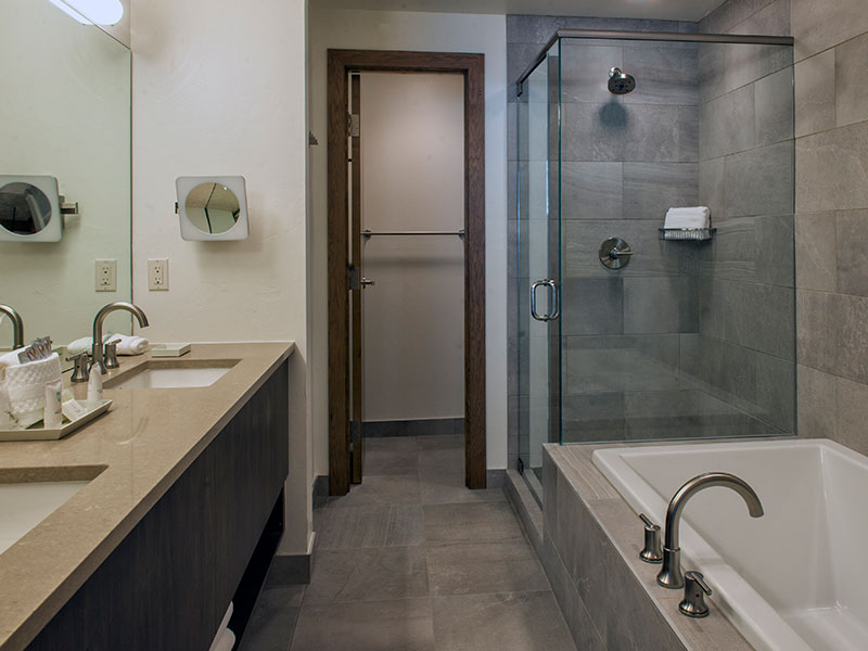 Modern spa-style bathroom with soaking tub and glass walk-in shower