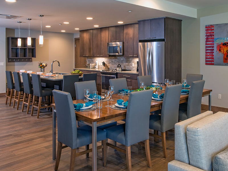Spacious modern kitchen and dining area with seating for large groups