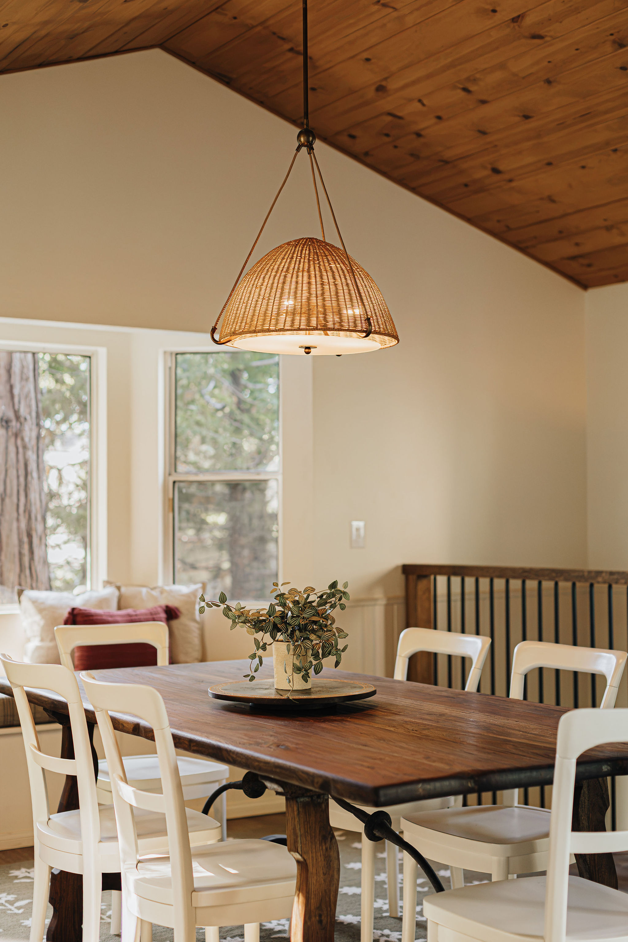 Cozy dining nook with rustic wood details and vaulted ceiling charm