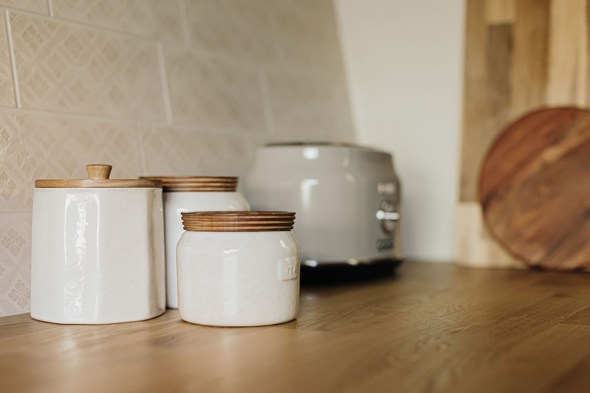 Thoughtfully styled kitchen with warm wood accents and modern touches