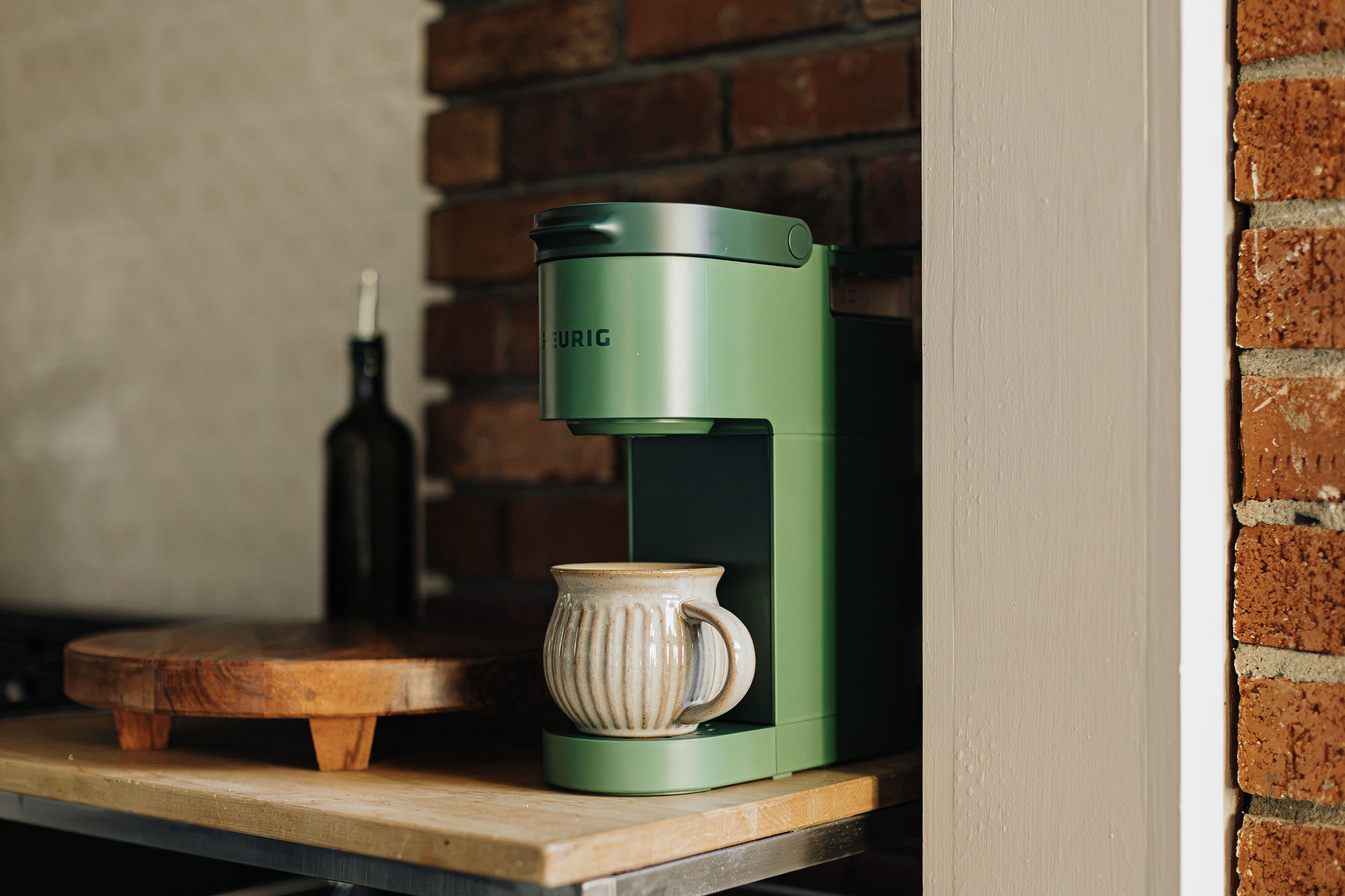 Cozy coffee nook with stylish brewer and warm rustic touches