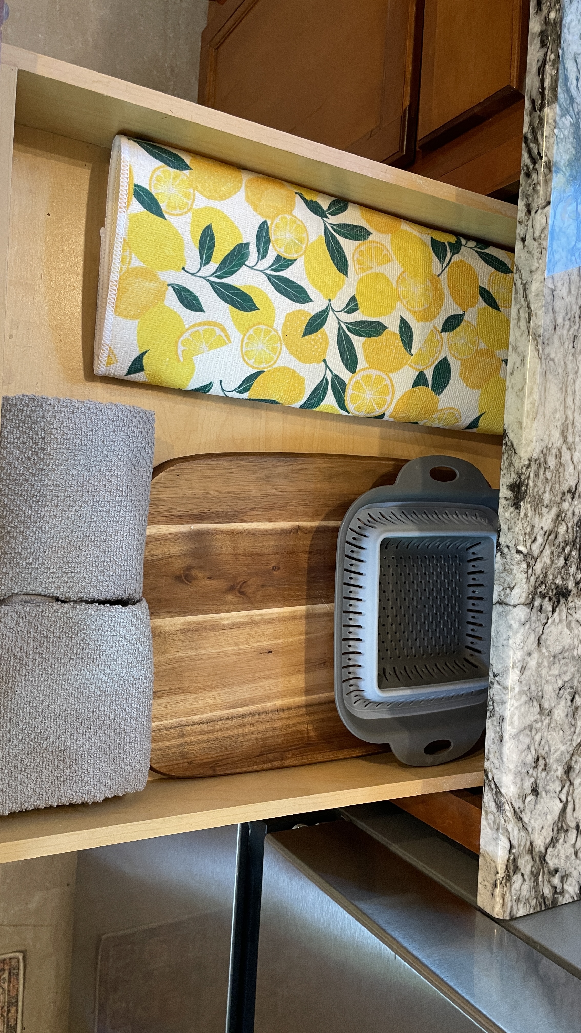 Well-stocked kitchen storage with cheerful touches and handy essentials