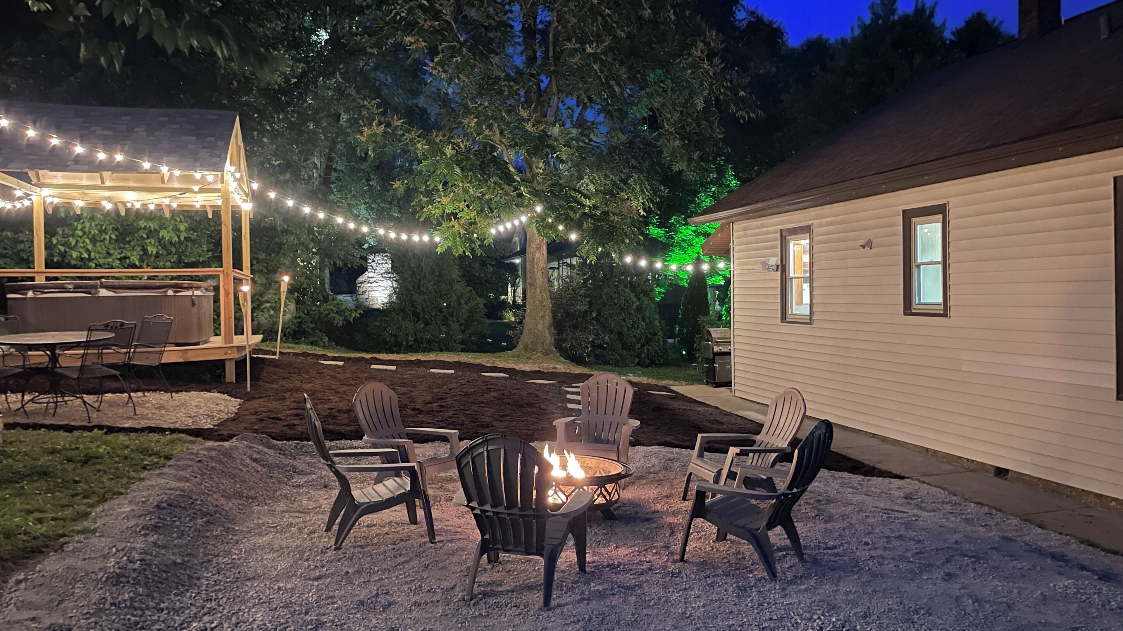 Relax in the 4 person hot tub or enjoy the firepit for 6