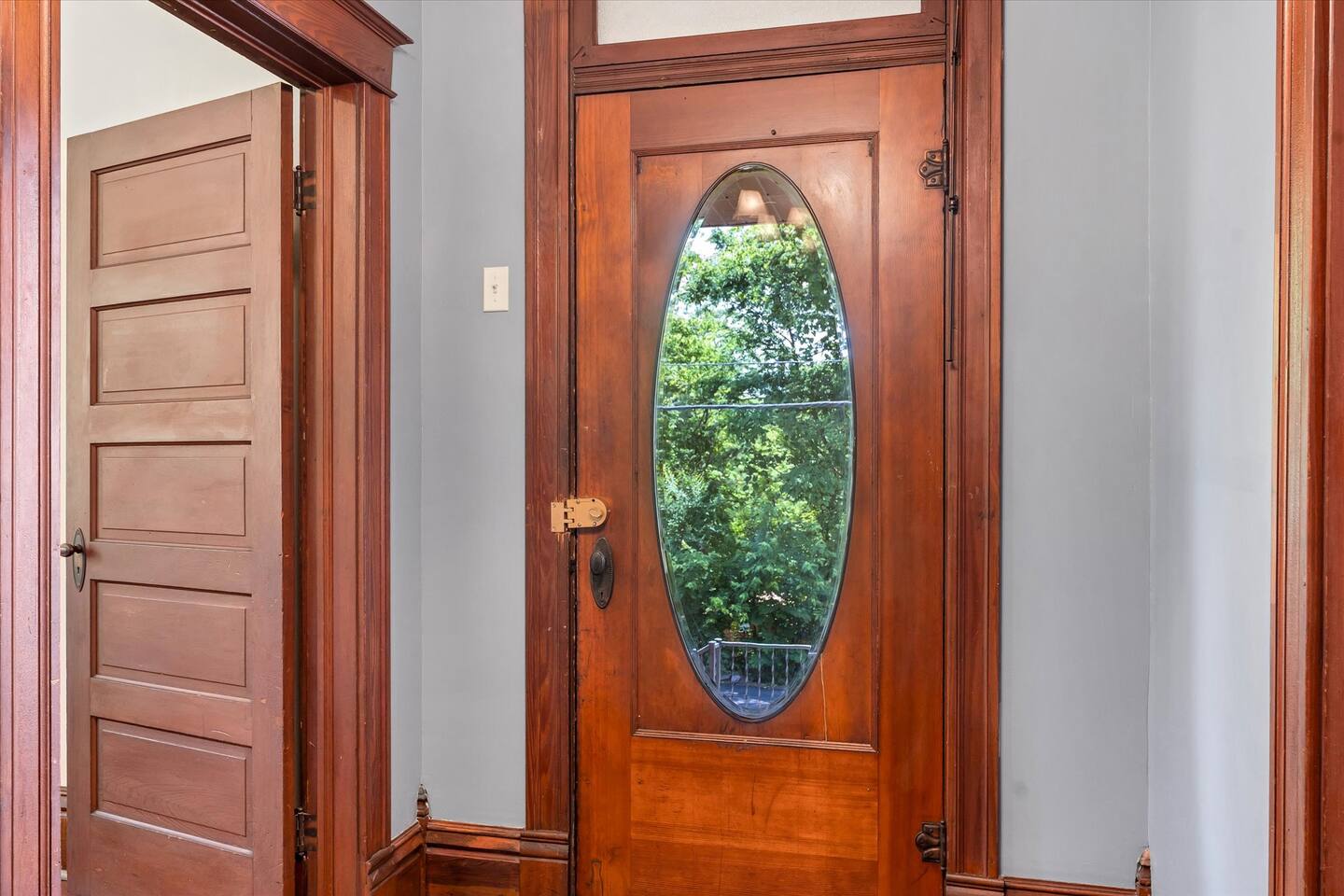 Front door leads to covered porch for lounging