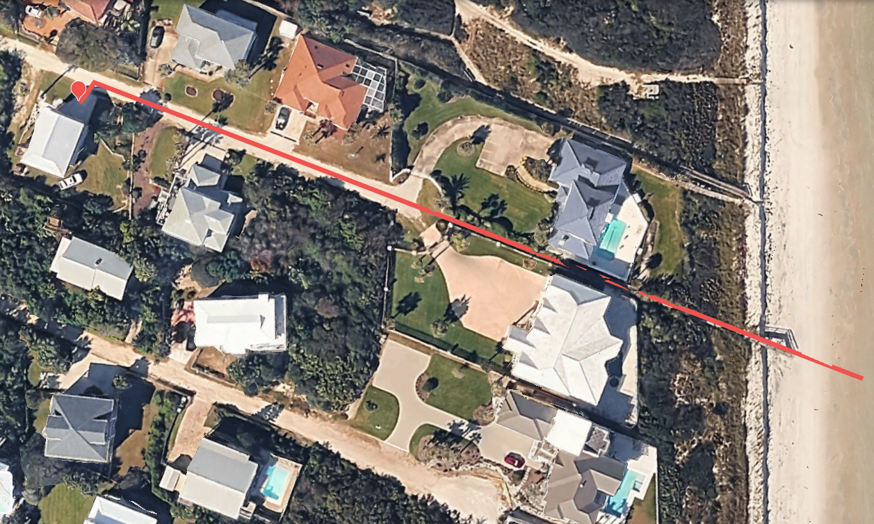 Aerial view showing the home's easy access and close proximity to the beach
