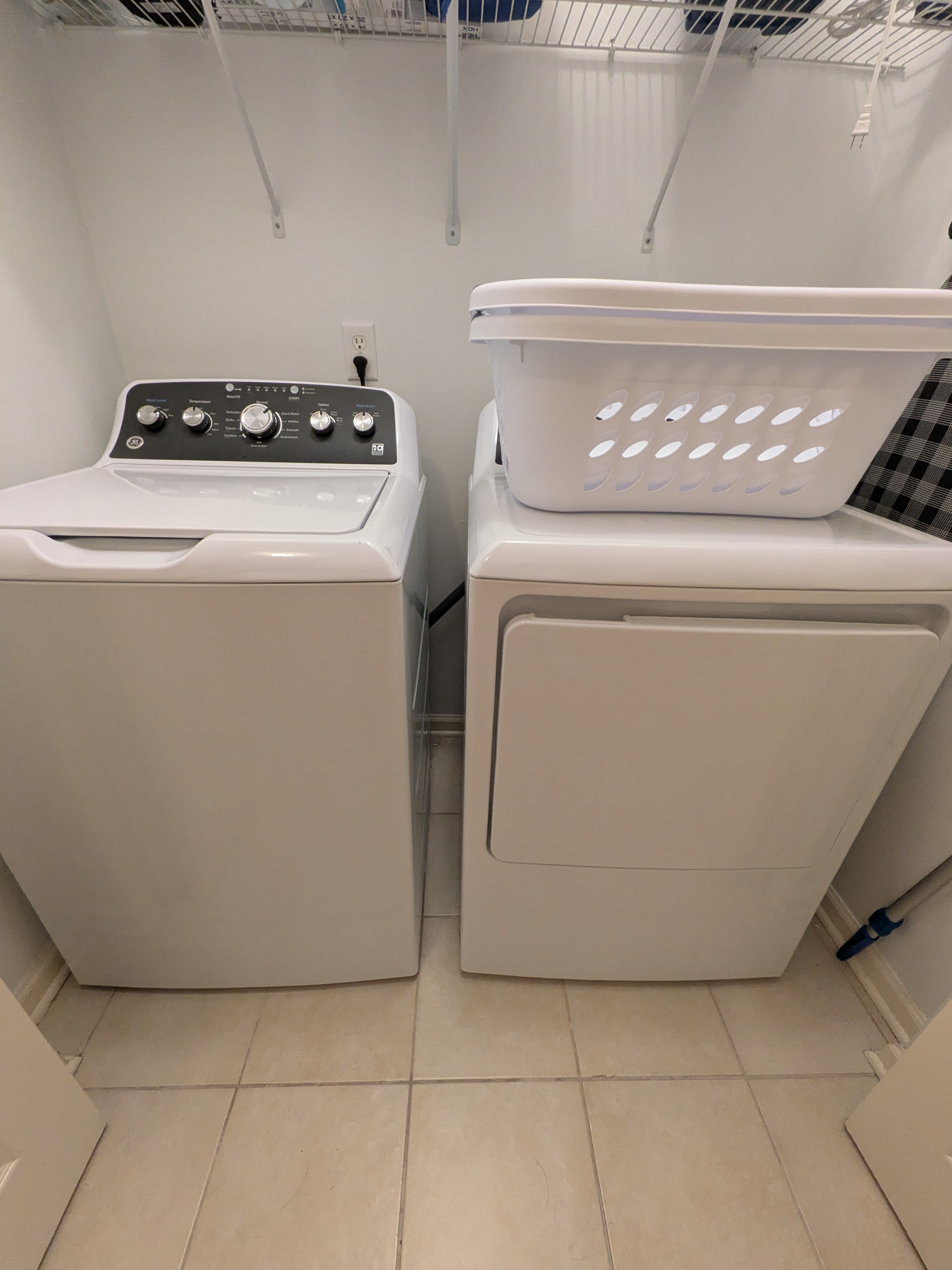 Convenient in-home washer and dryer with handy storage shelves