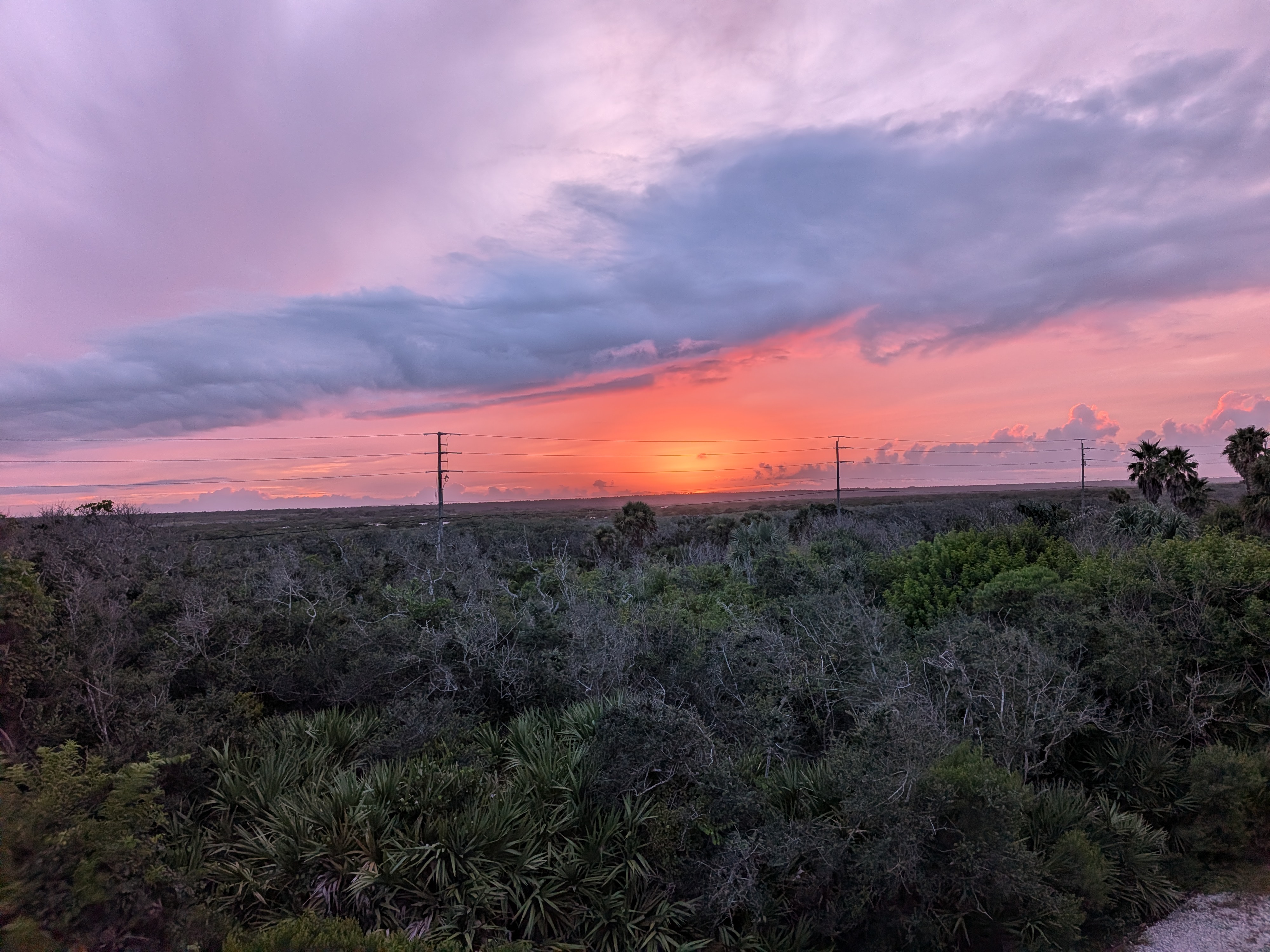 Breathtaking sunset views over lush coastal landscape