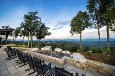 Relax in rocking chairs with sweeping mountain-view patio vistas