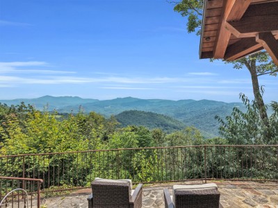 Settle into a chair on the covered deck and let the ridgelines do the talking.