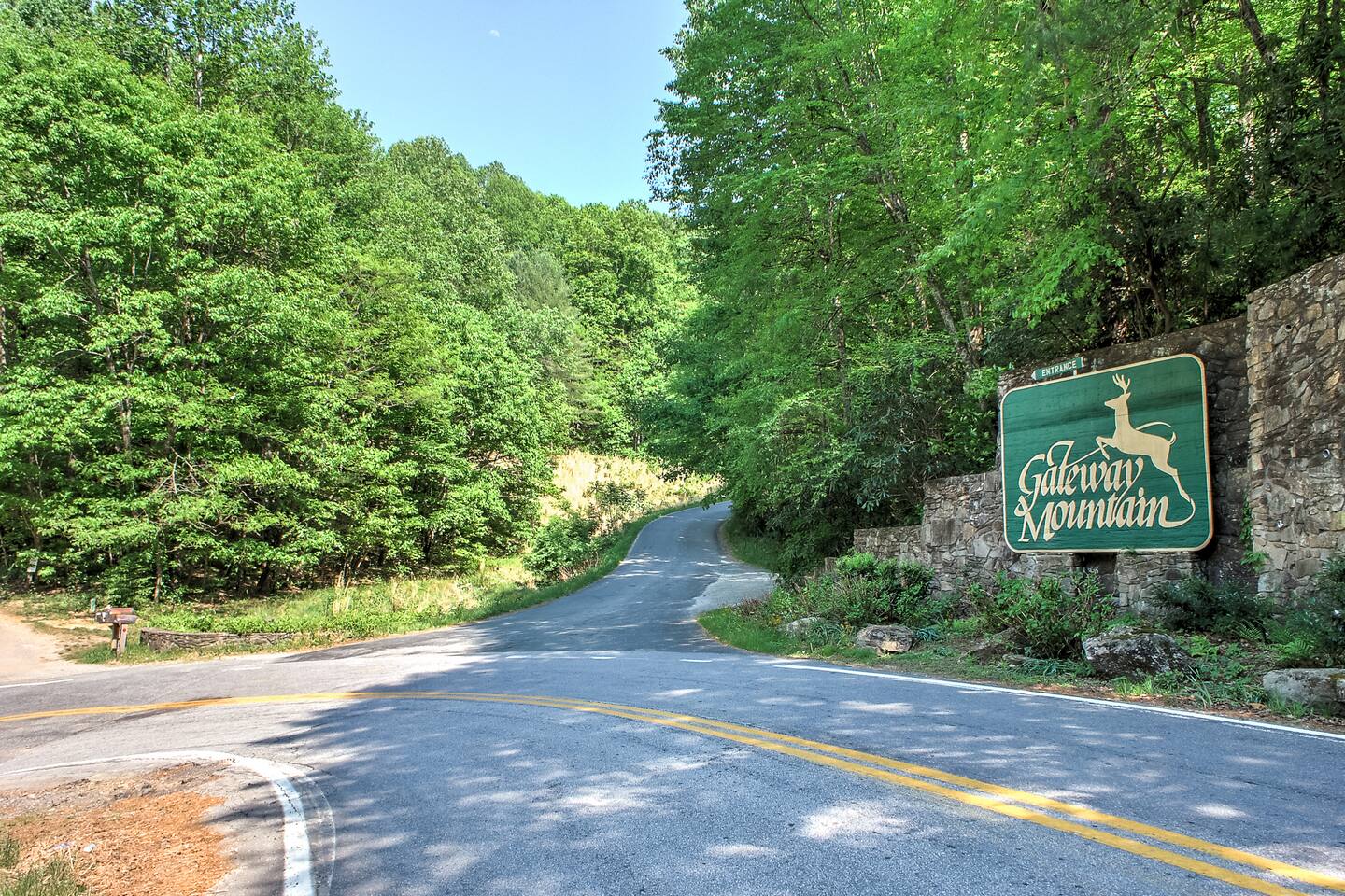 Turn off Bat Cave Road to arrive at the Main Gate in Gateway Mountain. Or keep going straight and find yourself in Lake Lure!