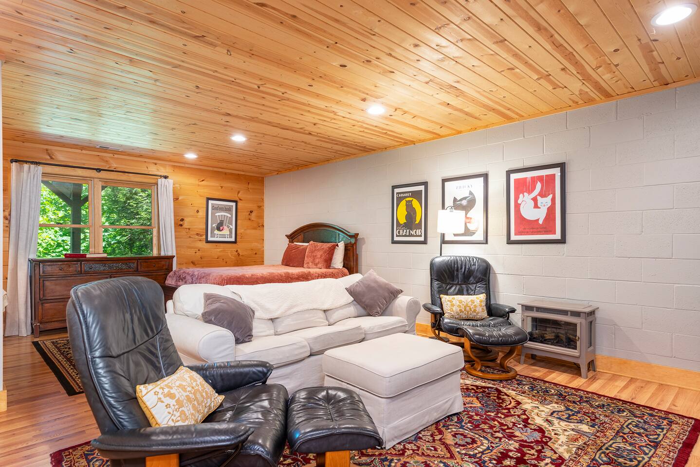 Kick back in these comfortable lounge chairs in front of the flat screen.