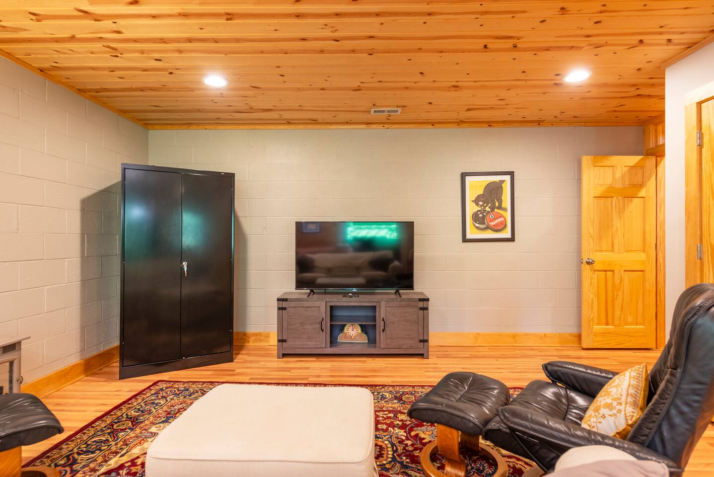 This living area features a smart TV and an extra heater.