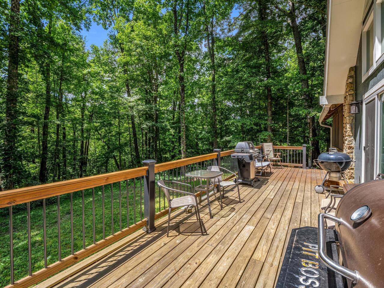 Two grills & the smoker has you covered! The main grill is hooked to the propane piping.