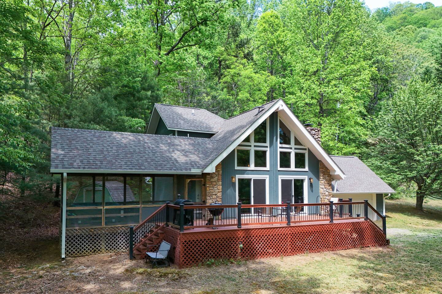 Enjoy the privacy of this home nestled in the trees within the Blue Ridge Mountains.