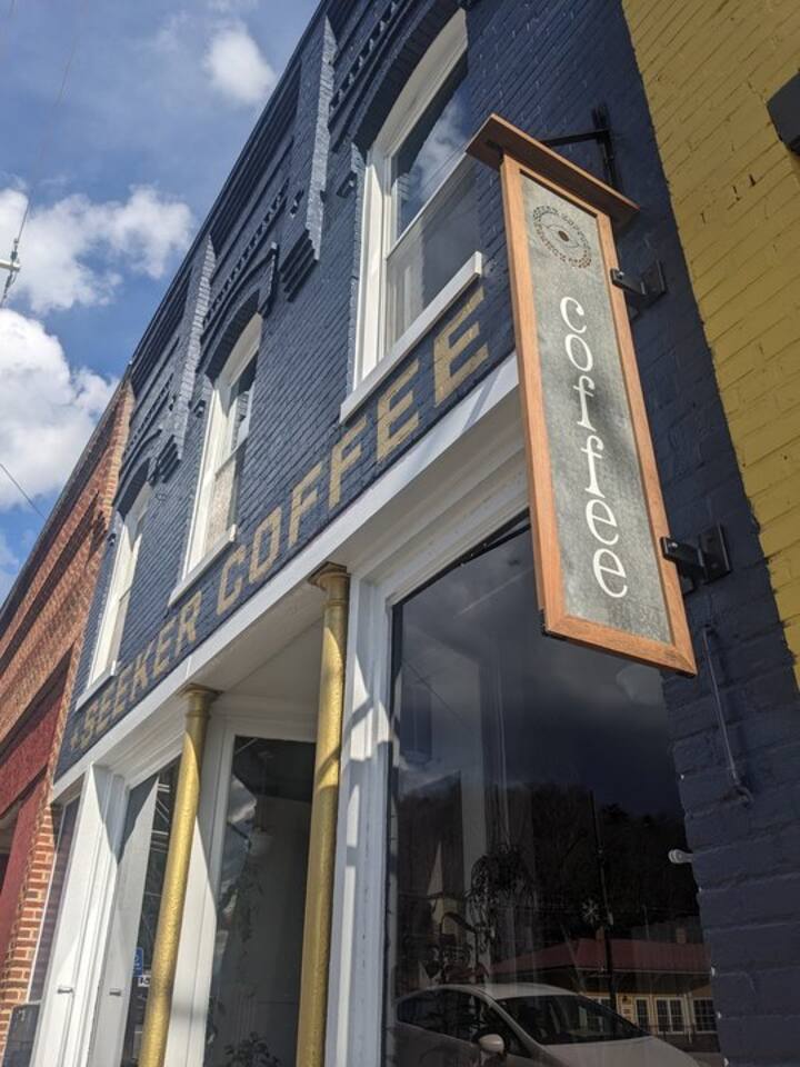 Handmade Artisanal Coffee Drinks, Teas, Light Snacks, Music, Entertainment and more. Featuring regionally roasted coffee. There's a full espresso menu as well as matcha, chai, drip coffee and even a pour-over. There's even some breakfast pastries.