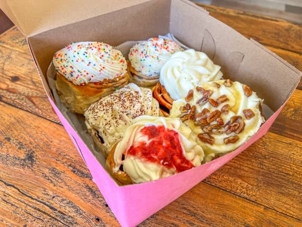 GoGo's is an absolute must-stop for warm yummy cinnamon rolls right down the street! They have over 10 flavors daily including maple bacon, birthday and our favorite Apple Pie! Just across the street and a few stores down, one can easily walk.