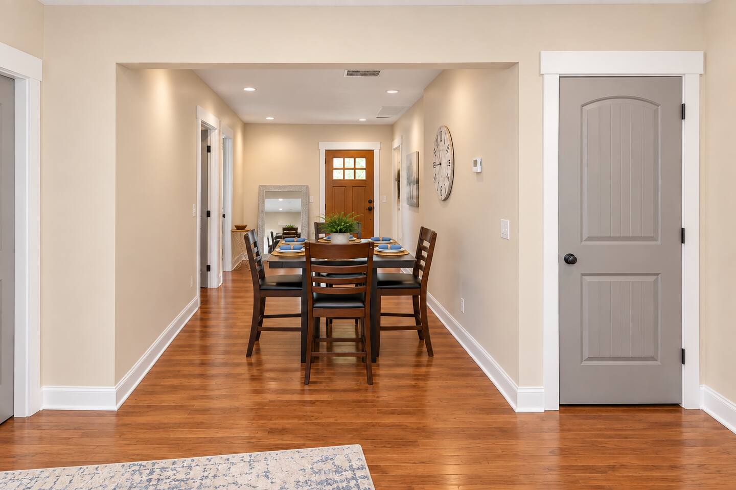 A welcoming central space that connects the dining area with the home's main living spaces.