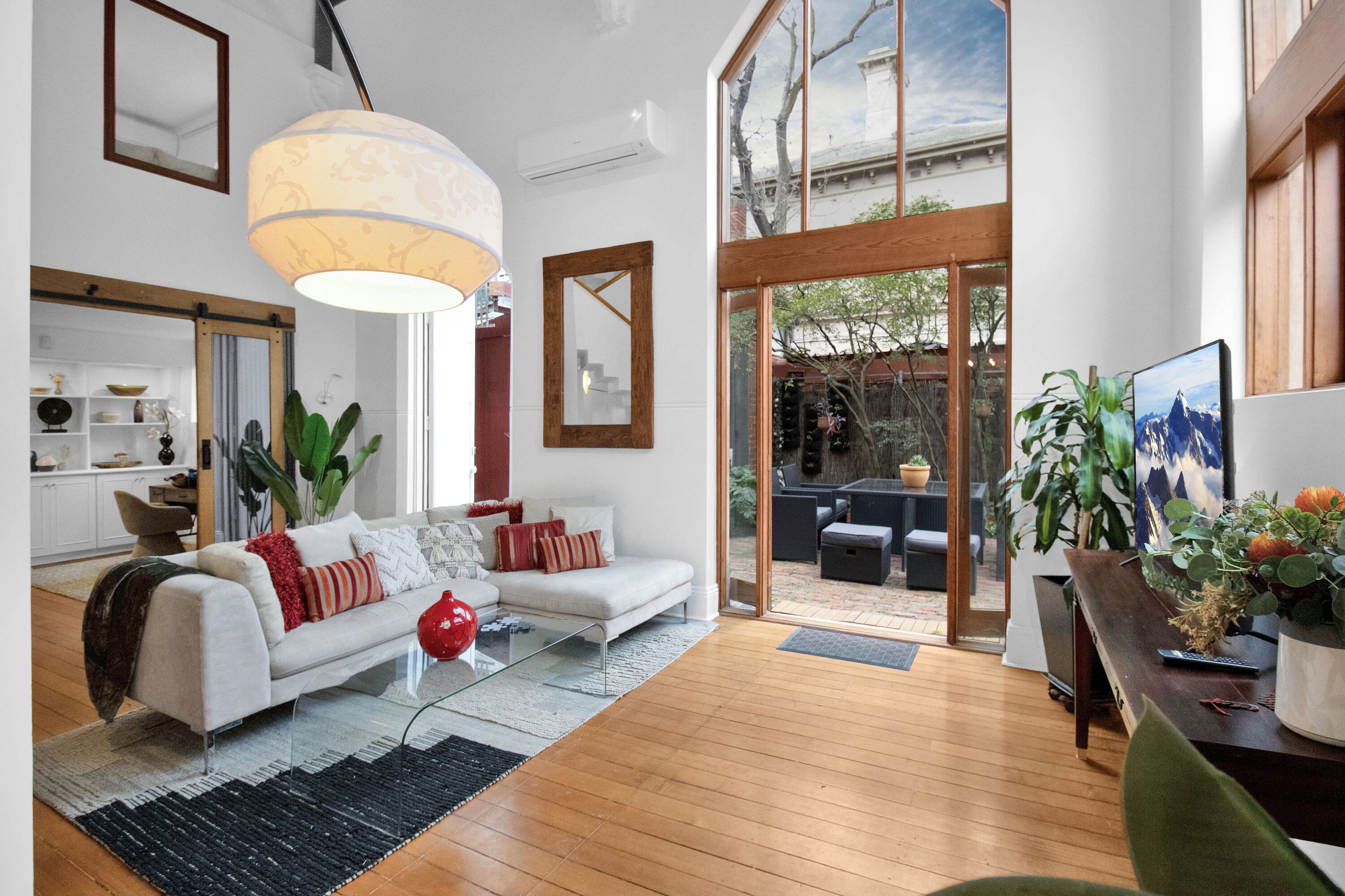Sun-filled loft living with soaring ceilings and a private courtyard patio