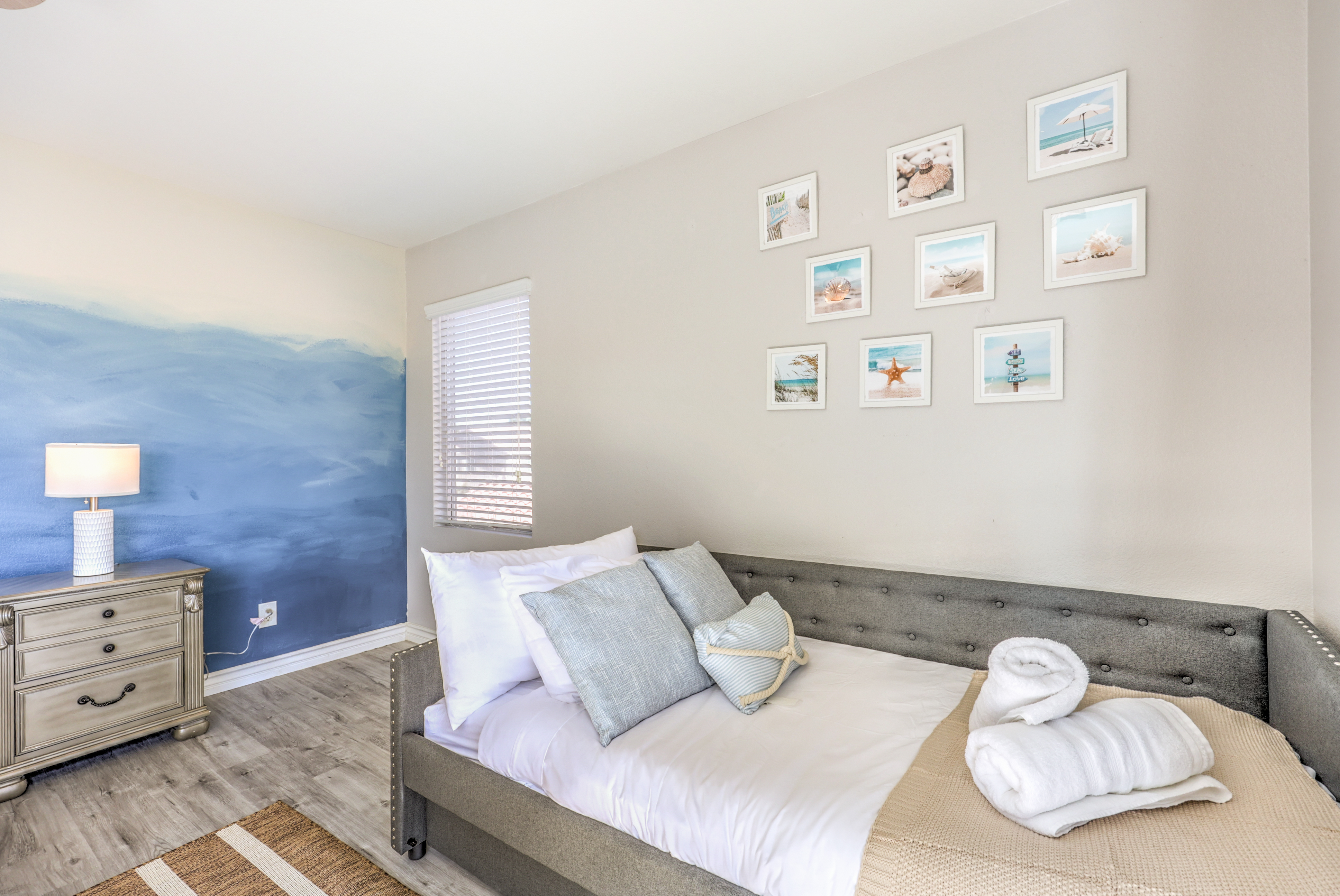 Coastal-inspired bedroom with cozy daybed and relaxing decor