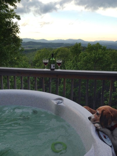 Soak in the hot tub with wine and sweeping mountain-view sunsets