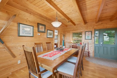 Dinner happens right by the front door, under pine beams and a vintage ski on the wall. Come in from a day on the slopes at Appalachian Ski Mountain, kick off your boots on the entry rug, and pull up a cushioned chair at the family-size table.