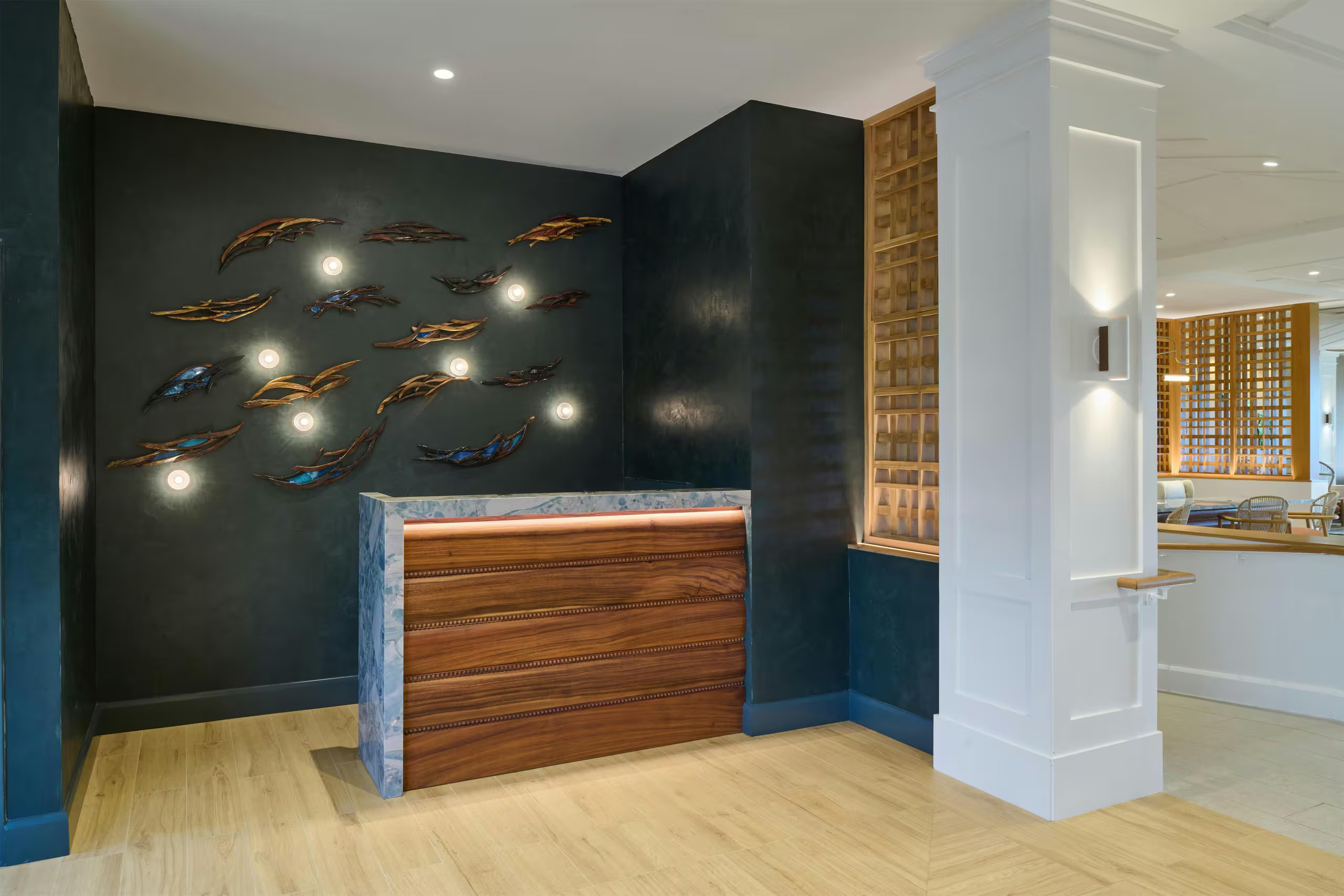 Elegant modern lobby with designer lighting and upscale coastal-inspired décor