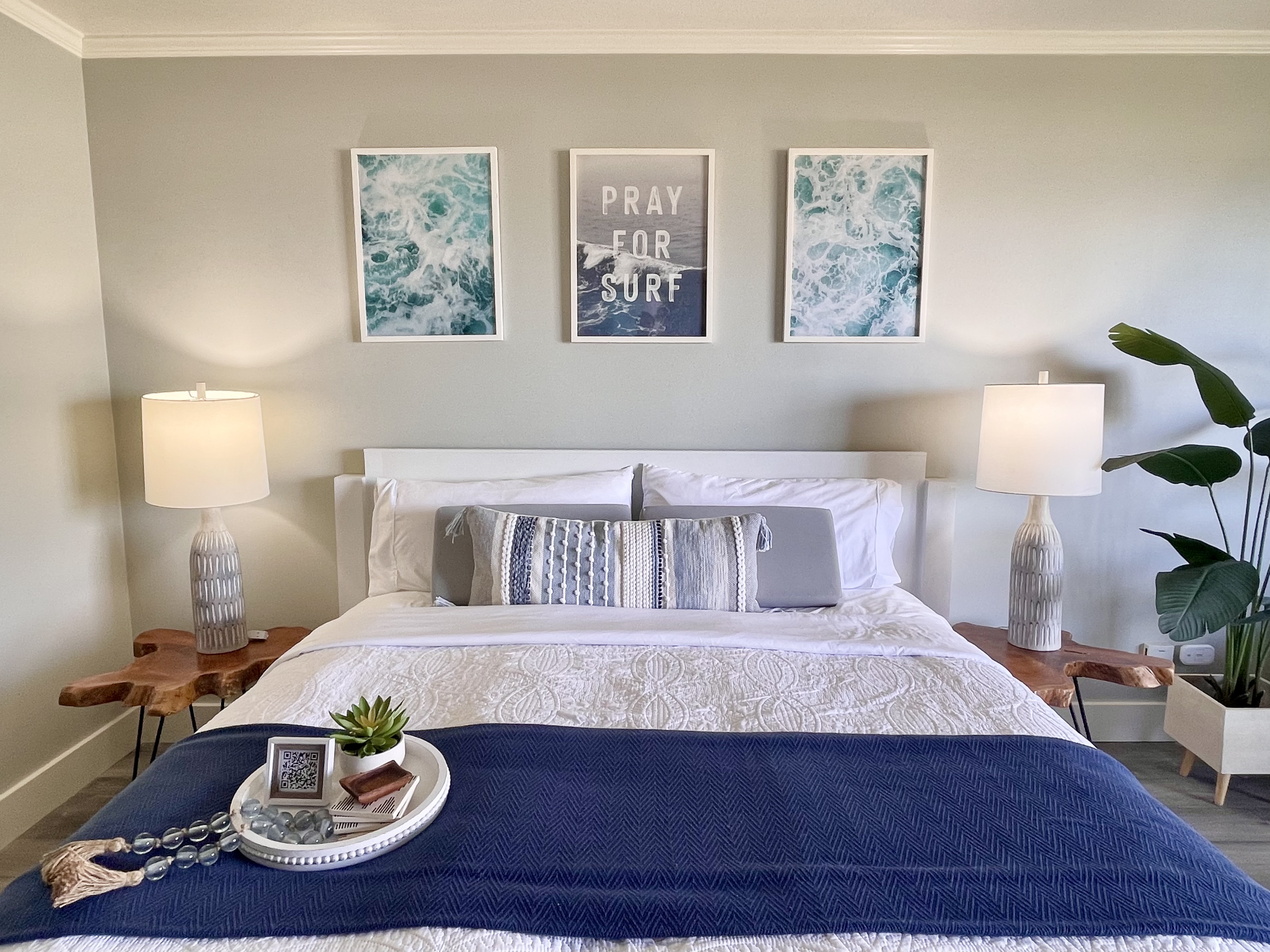 Coastal-inspired bedroom with plush king bed and serene, stylish decor