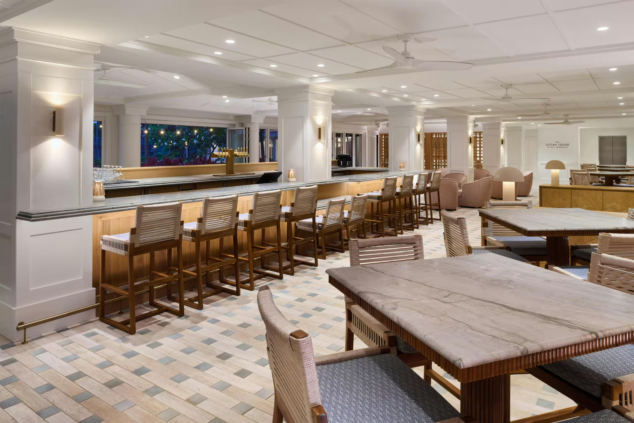 Elegant lounge and bar area with spacious seating, coastal style and nightly live music at Ocean House lounge