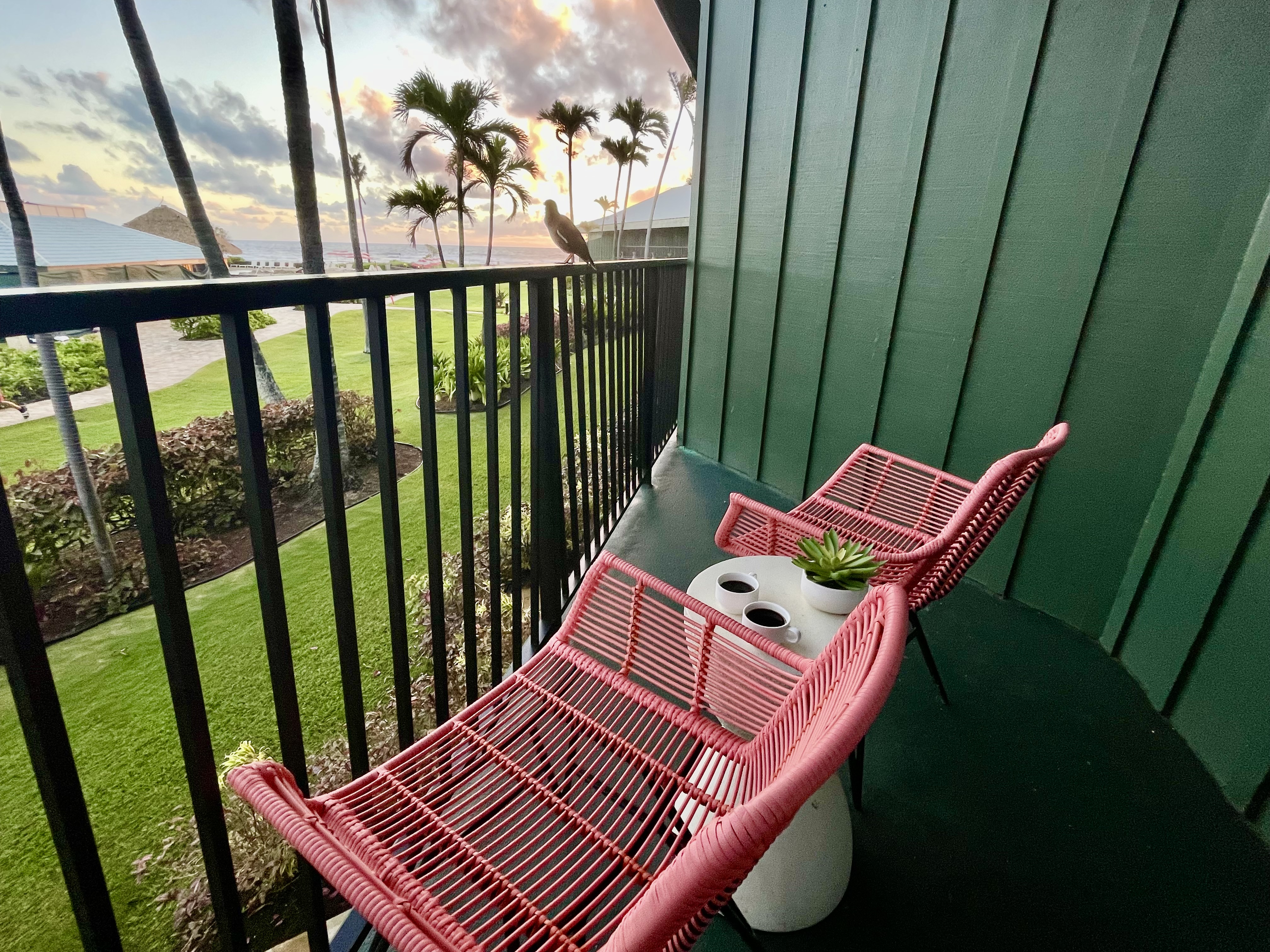 Private tropical lanai with resort and ocean views, perfect for watching the sunrise