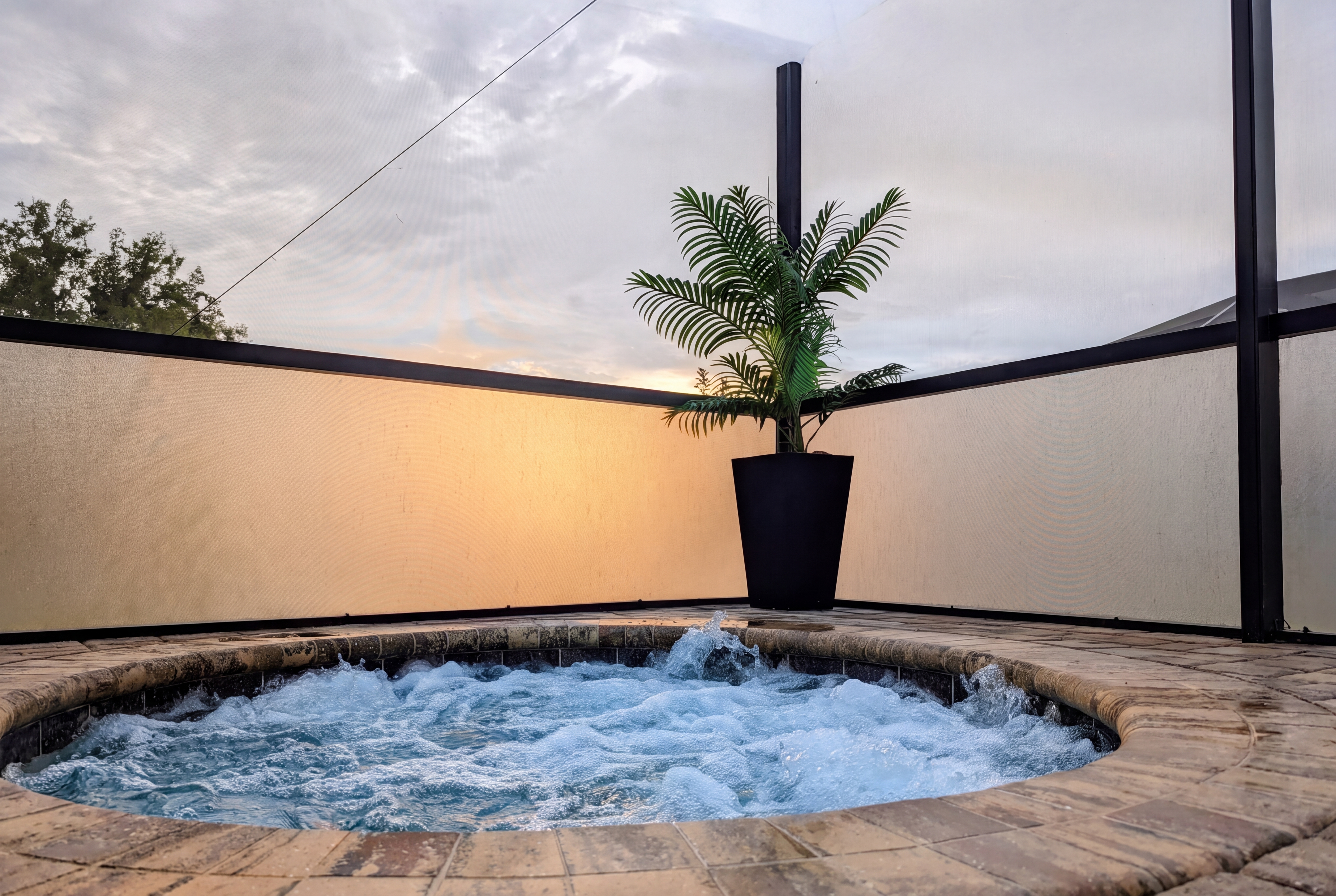 Private screened spillover spa with optional heating.