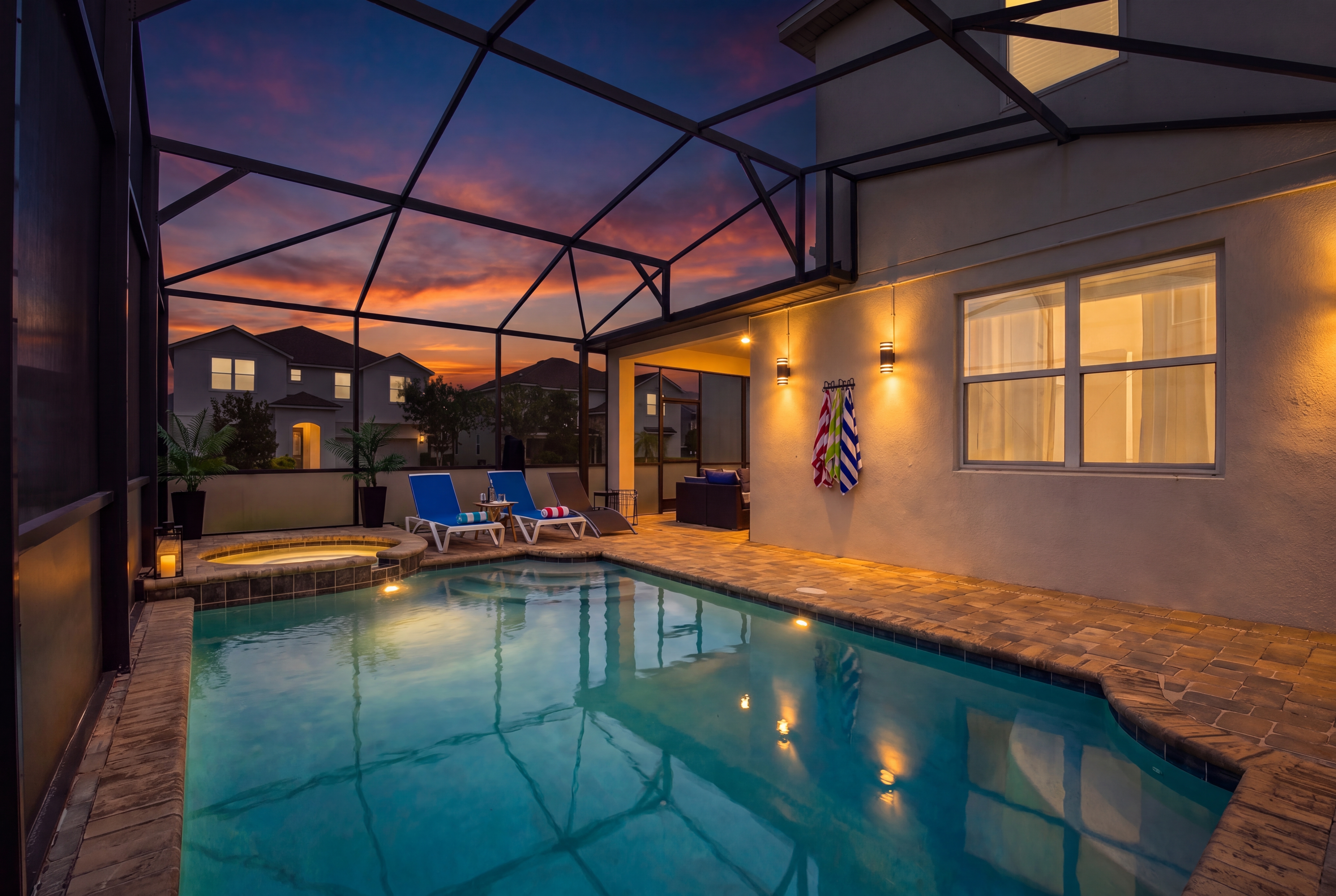 Private screened pool & spa with sunset views and relaxing lounge space