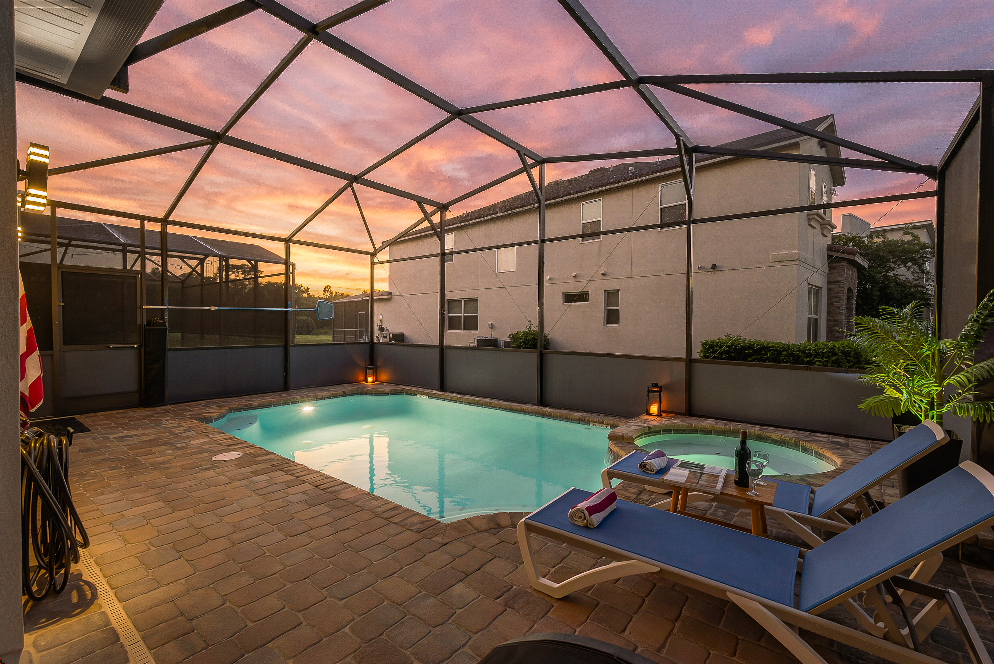 Private screened pool & spa with sunset views and relaxing lounge seating
