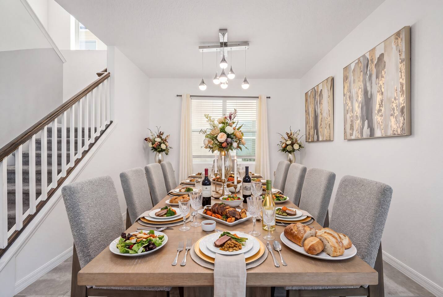 Gather the whole group around a large dining table that seats 10, right off the kitchen and beneath the staircase. The perfect spot for a big family dinner after a day at the parks, with room for everyone to sit together.