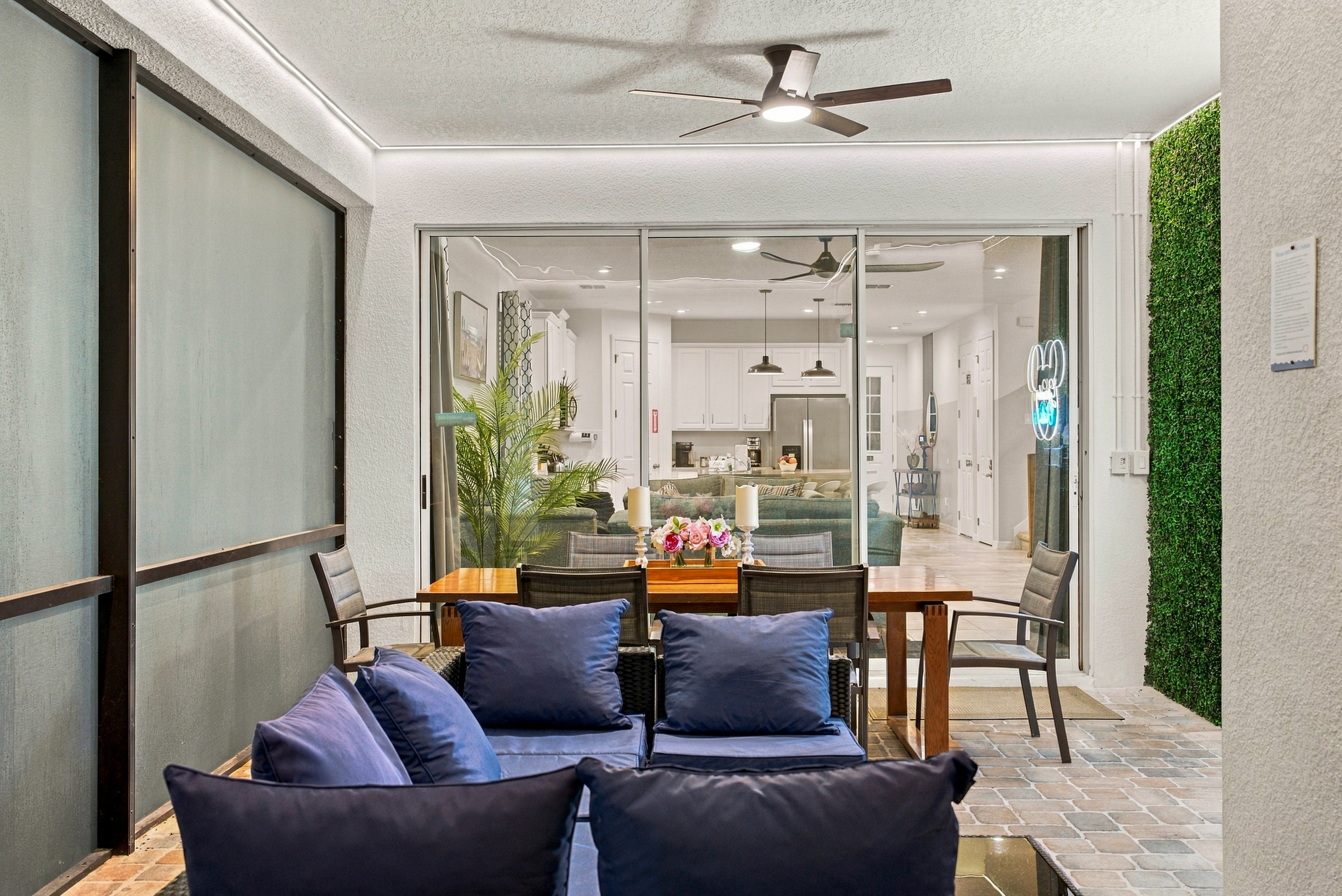 Covered patio with cozy seating and seamless indoor-outdoor living