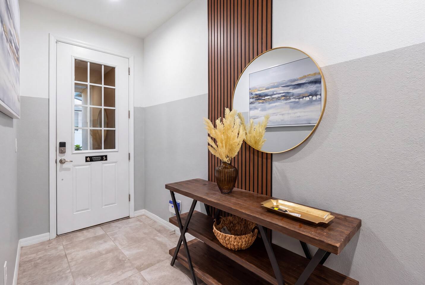 Step into a warm, welcoming entryway with keyless entry, a wood-slat feature wall, and a console for keys and bags. Contactless check-in means you can arrive on your own schedule and settle right in.