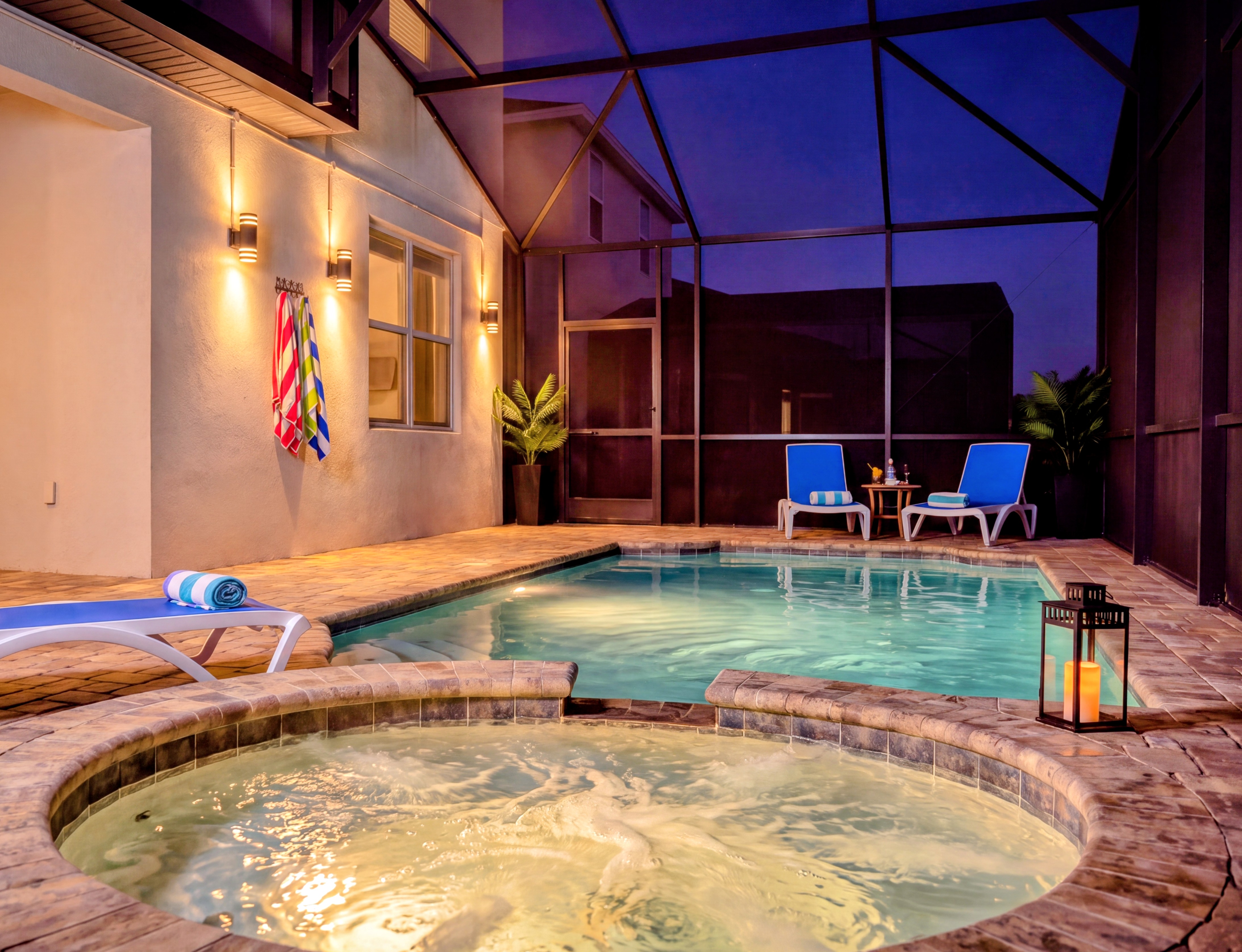 Private screened pool & spa with relaxing resort-style evening ambiance