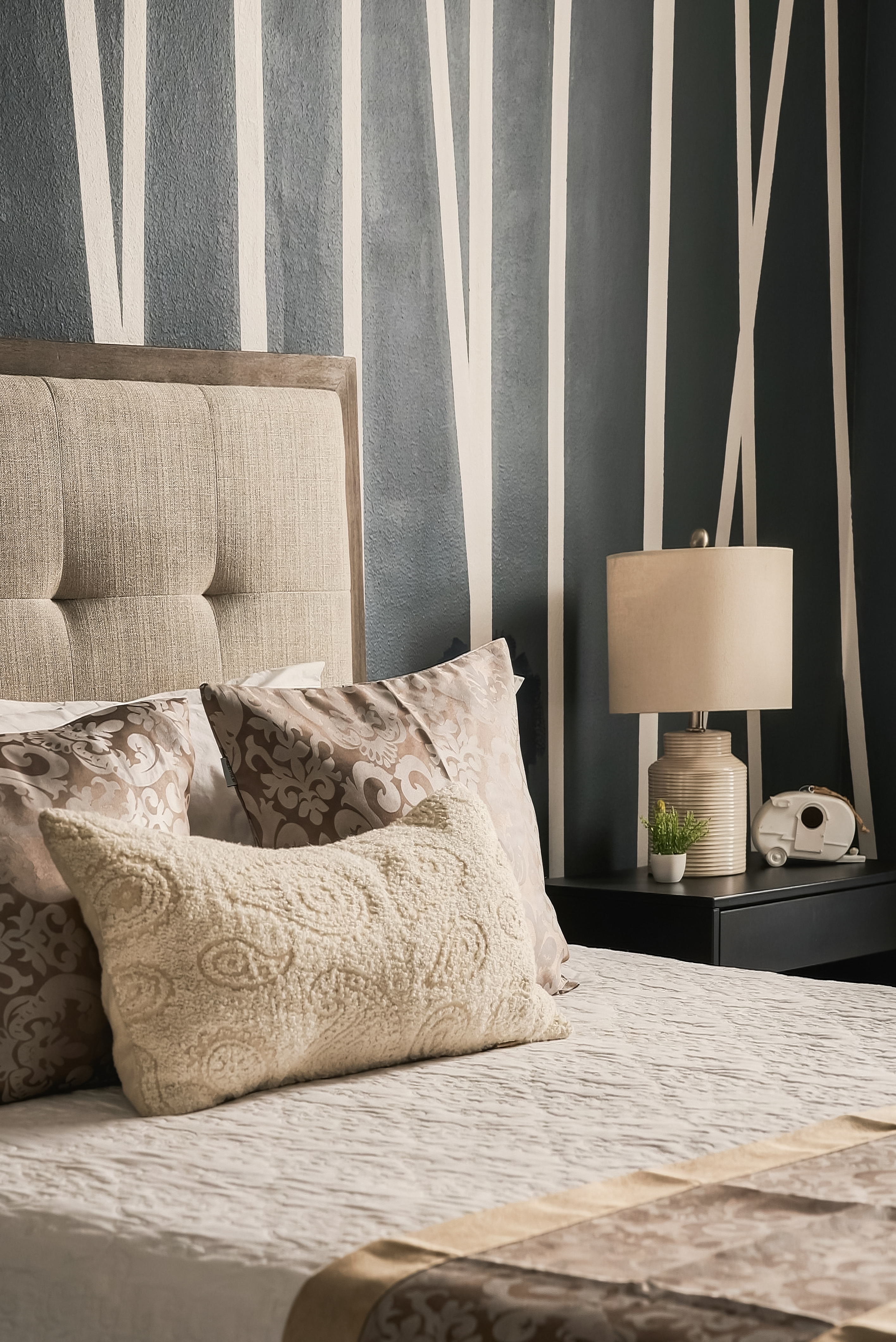 A calm, stylish retreat on the main floor. Queen bed, smart TV, ceiling fan, and central air keep it comfortable, with a full-length mirror and a closet with hangers for settling in. A full bathroom is located just outside the door.