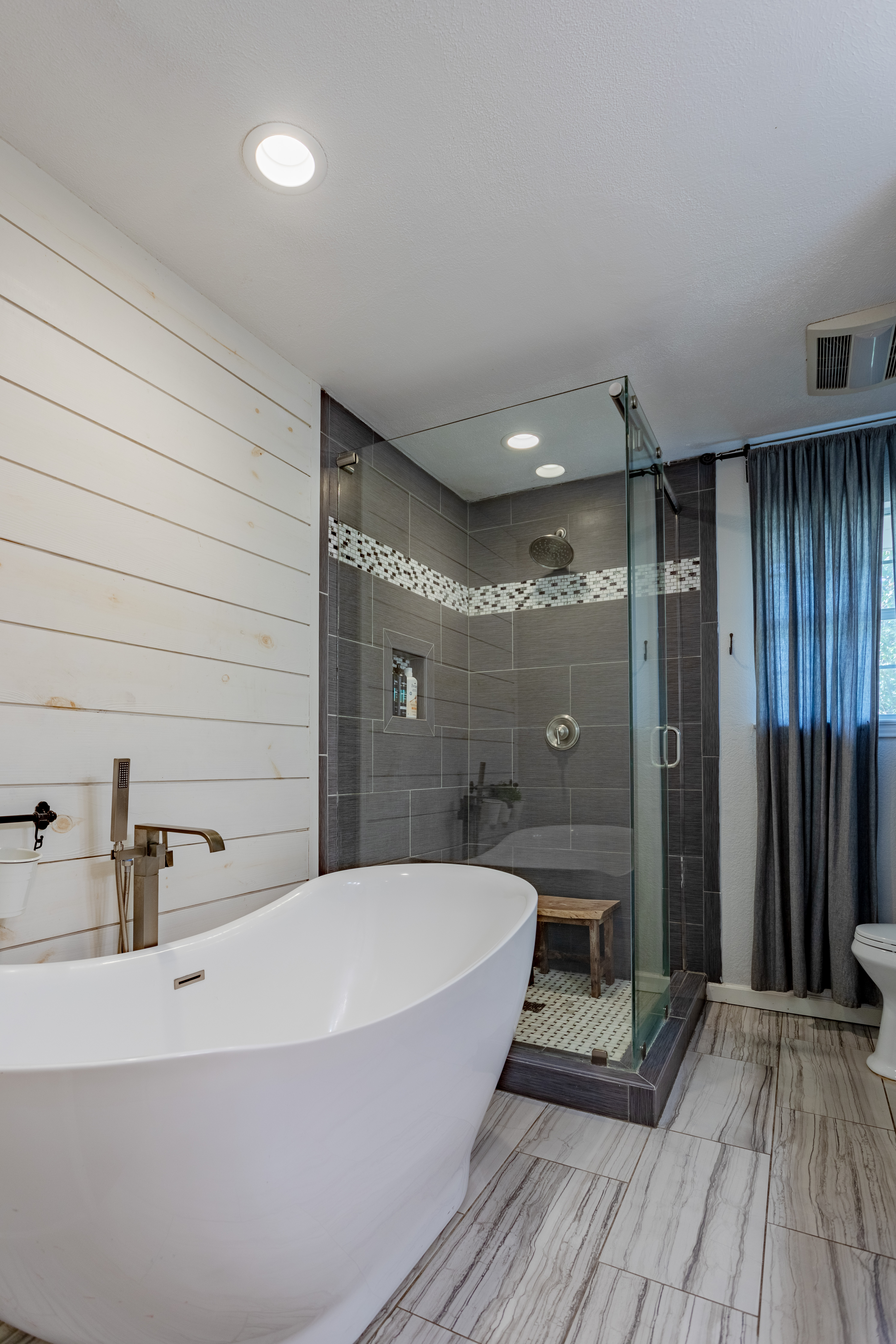 Spa-inspired bath with soaking tub and sleek walk-in glass shower